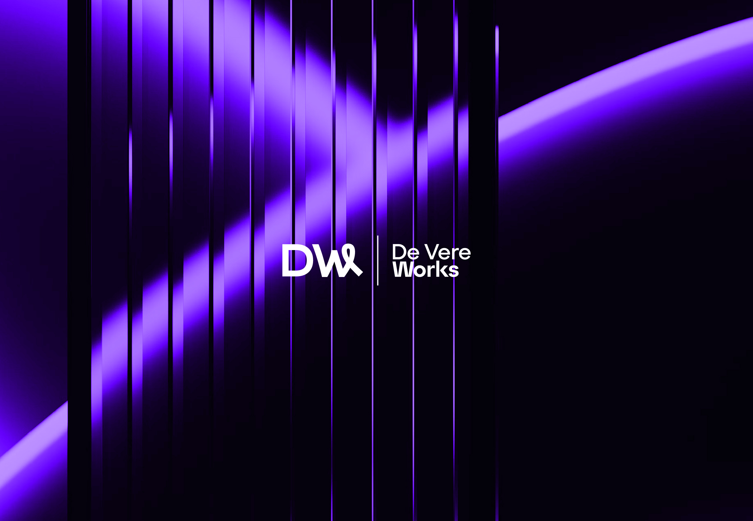 De Vere Works identity against architectural purple glass